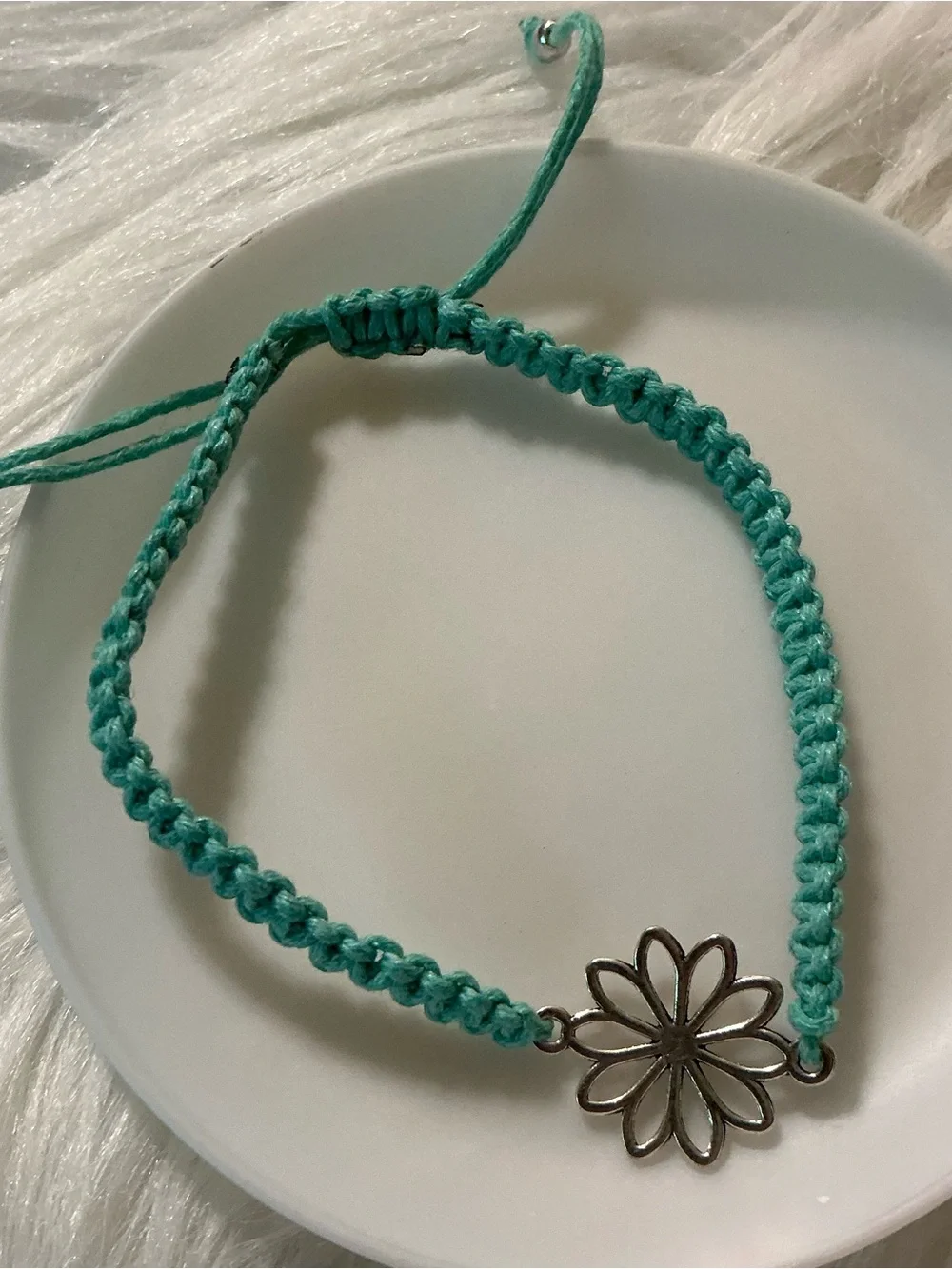 Pretty blue floral charm string bracelet